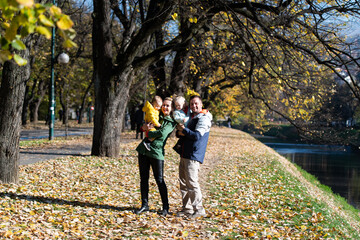 Warm Family Moments In The Colorful Park