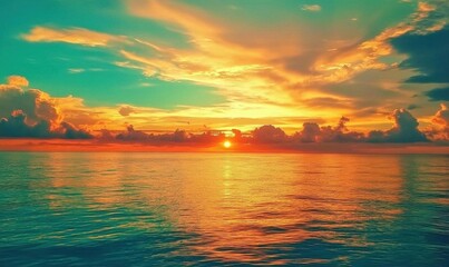 Obraz premium A serene sunset over calm ocean waters, creating a peaceful atmosphere.