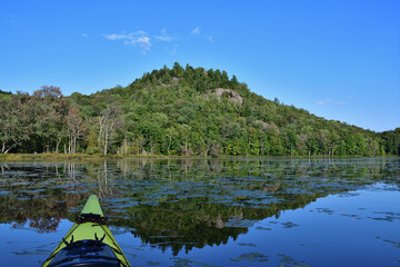 SEPAQ Orford national park kayak exploration of Cherry pond and Serpentine hill on the background....