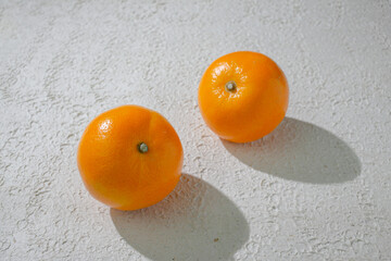 A vibrant orange isolated on a clean white background, representing freshness, health, and natural citrus goodness, ideal for food related visuals