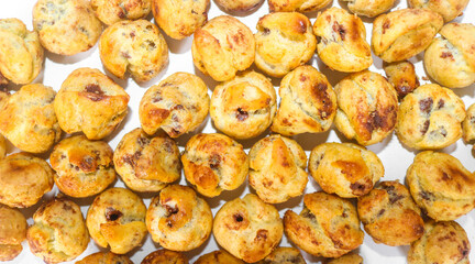 Collection of Soes Cake or Choux Pastry with chocolate filling inside isolated on white background. Chocolate choux pastry is round in shape