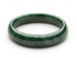 A smooth, green jade bangle bracelet with a polished finish, showcasing its elegant and...