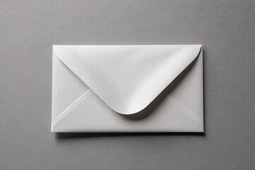 an envelope with a white paper on a gray surface