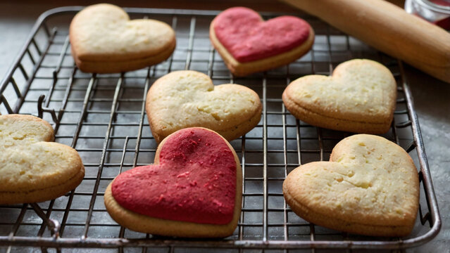 Freshly Baked Heart-Shaped Cookies on a Cooling Rack