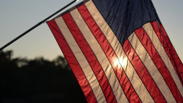 Waving American Flag at Sunset Outdoor Scenic Closeup Nature Tranquil Environment Artistic Viewpoint Patriotism Concept