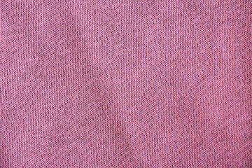 Simple pale pink jersey fabric from above