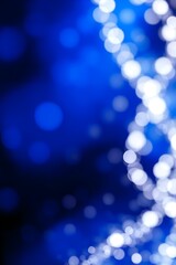 Glamorous Blue Background with Glitter and Bokeh Lights