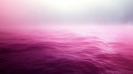 Pink Ocean Waves Under a Misty Sky