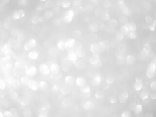 Background grey bokeh abstarct white beige circle light texture bubble blur pattern defocused glowing sparkle snow glitter snowflake magig backdrop ecosystem foreground card silver space decoration.