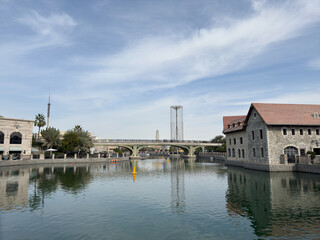 A vibrant snapshot of Riverland Dubai, where charming cobblestone streets, picturesque bridges, and scenic waterways transport you to a world of timeless charm. Lush greenery and European-style.