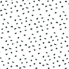 Small, jagged spots or dots create texture or screentone.