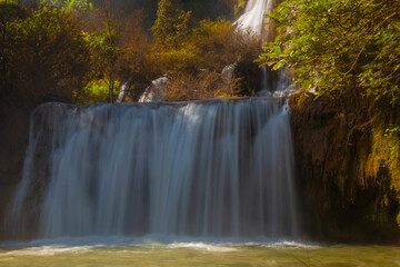 Obraz premium Thi Lo Su Waterfall is the largest waterfall in Thailand. It is located on a limestone mountain with many levels. It is located in Umphang Wildlife Sanctuary, which borders Myanmar