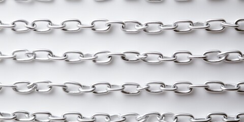 Fototapeta premium Close-up view of interlinked metal chains representing strength, connection, and durability in various industrial applications.