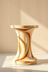 cream-colored pedestal with brown swirling