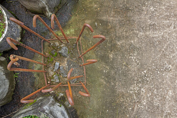 Top View of Iron Reinforcement Column Supporting Rough Concrete Structure.