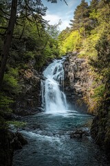 Obraz premium A beautiful waterfall in the forest, colorful foliage, vibrant colors, turquoise water, sunlight filtering through trees, natural scenery, wide angle lens, national geographic photography style..