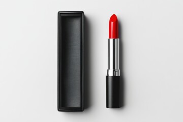 Bright red lipstick shown beside its sleek black case on a clean surface ideal for beauty product display