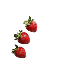 Three ripe strawberries isolated on black.