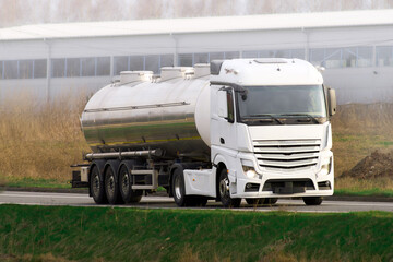 Tanker Truck on Highway Journey. Fuel on the Move