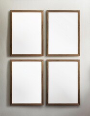 Fototapeta premium Four small framed blank poster mockups in portrait on wall - Mockup