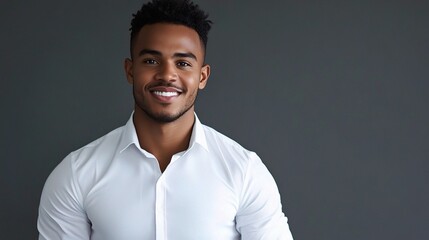 Obraz premium Confident Young African Businessman Wearing White Shirt on Gray Background