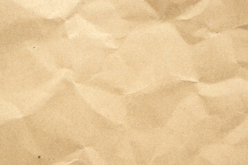 Abstract crumpled and creased recycle brown paper texture background