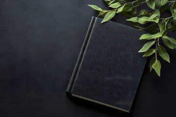 Dark book cover mockup with green leaves on black background. (1)