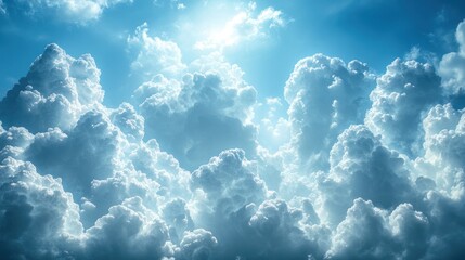Fototapeta premium Bright sun shining through fluffy cumulus clouds.