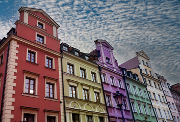 Vibrant colorful buildings on a street in a historic town, Poland, Wroclaw