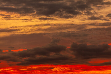 A Stunningly Dramatic Sunset Sky with an Array of Colorful Clouds Intertwined in a Beautiful Display