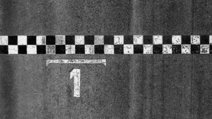 Gordijnen Aerial view race grid start, Start and finish line race track background top view, Start and finish of track racing asphalt road. © Kalyakan