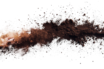 Brown powder spreads across a white surface creating an artistic texture and pattern