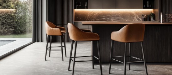 Modern leather bar stools featuring a sleek design ideal for contemporary kitchen and home bar settings.