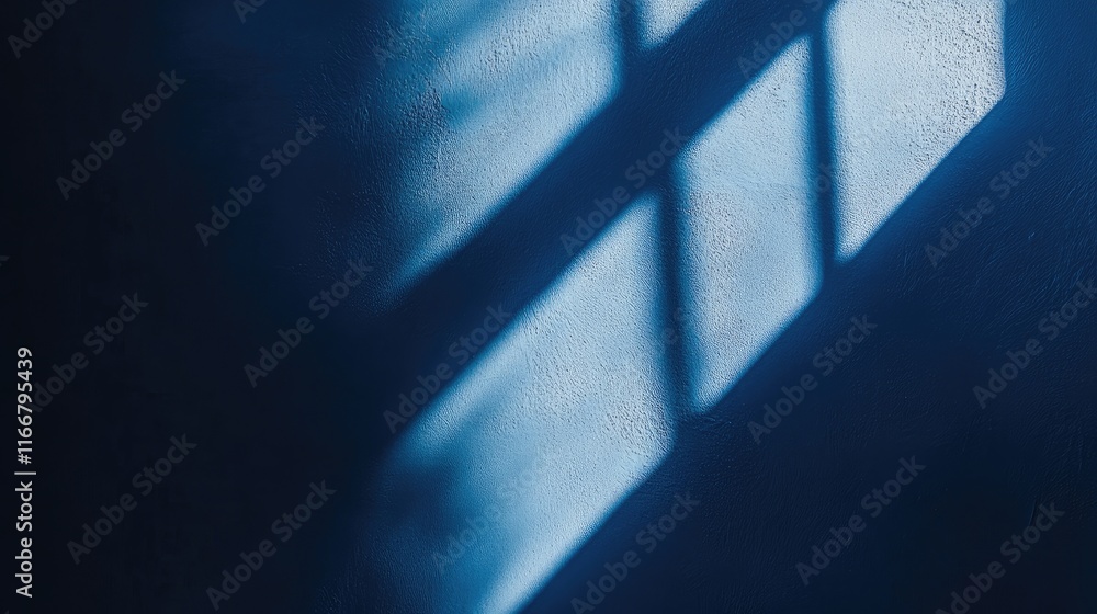 Aufkleber natural light and shadow play on a dark blue textured surface creating a serene backdrop for product