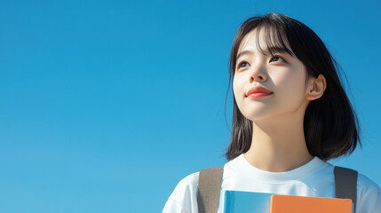 Korean teenage student girl holding textbook go to school library