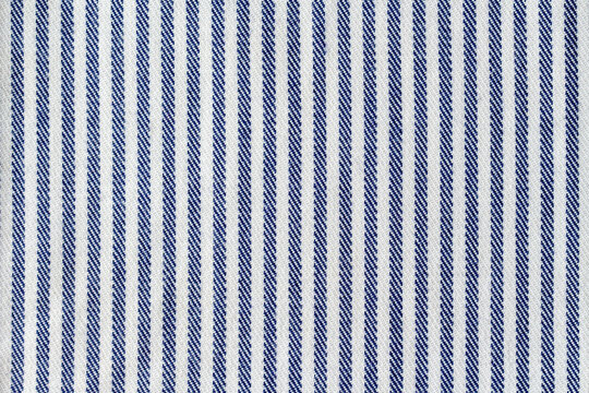 Blue and white striped woven fabric background