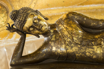 sleep Buddha image in the temple made from mental,  Hair curl, Thailand