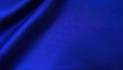 Vivid Deep Royal Blue Silk Fabric Texture Background with Elegant Flowing Waves and Subtle Diagonal Lines Perfect for Design Projects, Luxury Branding, or Product Photography. High-Quality Copy Space