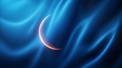 A crescent moon in the middle of a blue satin background