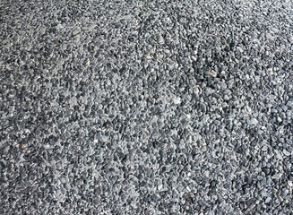 Grey gravel, blue stone textured background