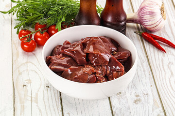 Raw chicken liver uncooked in the bowl