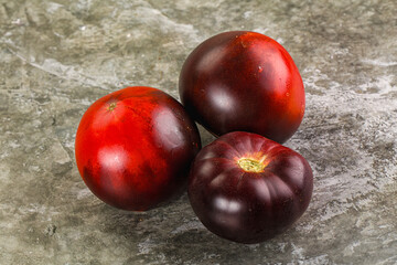 Black ripe juicy organic tomato
