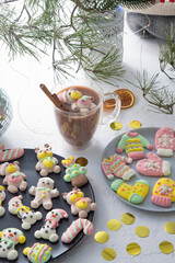 Christmas marshmallows. Winter candy. Sweet food in december. Snowman and Santa Claus