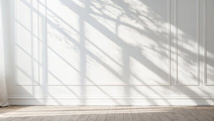 Minimalistic light background with blurred foliage shadow on white wall