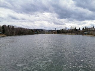 Tranquil River Scene Under a Cloudy Sky
