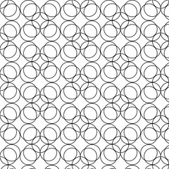 Stacked layered circle geometric pattern with a kawung-like theme. Black and white oval-themed seamless pattern.