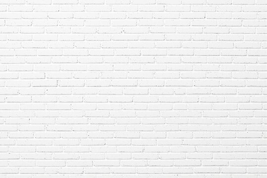 Fototapeta A clean white brick wall texture, minimalistic style, with a uniform pattern. Neutral background ideal for design concepts, Ai generative