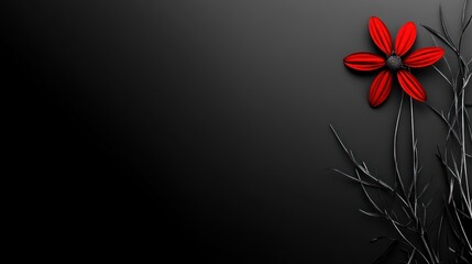 Obraz premium Single red flower on dark background with black branches.