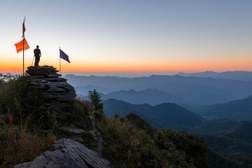 Obraz premium A man standing on top of the mountain, overlooking distant mountains and clear sky at sunrise with copy space for text. A hiker stands in awe as they look out over the vast landscape from atop Pui