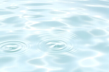 Close-up of gentle ripples on a calm water surface, creating a soothing and serene pattern. Wellness, cosmetics, and eco-friendly advertising banners.